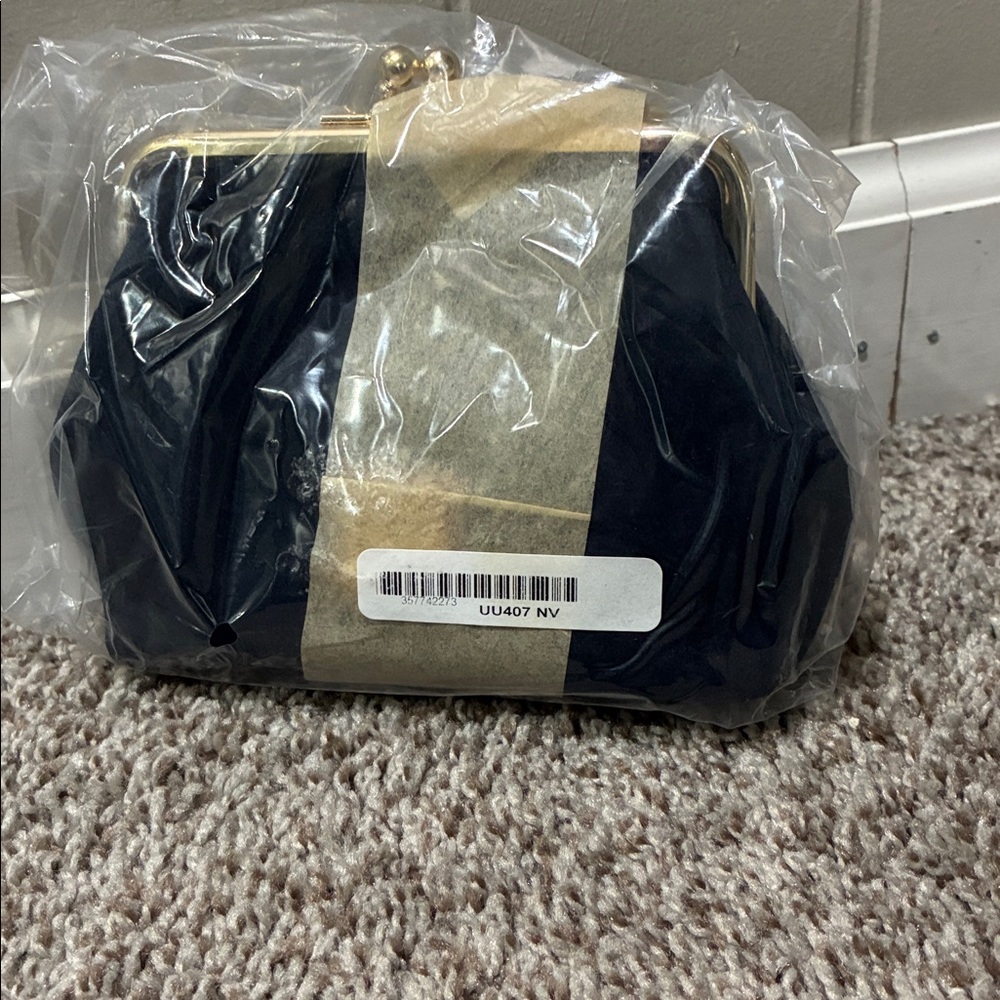Dooney and Bourke Suede Framed Kisslock Wallet